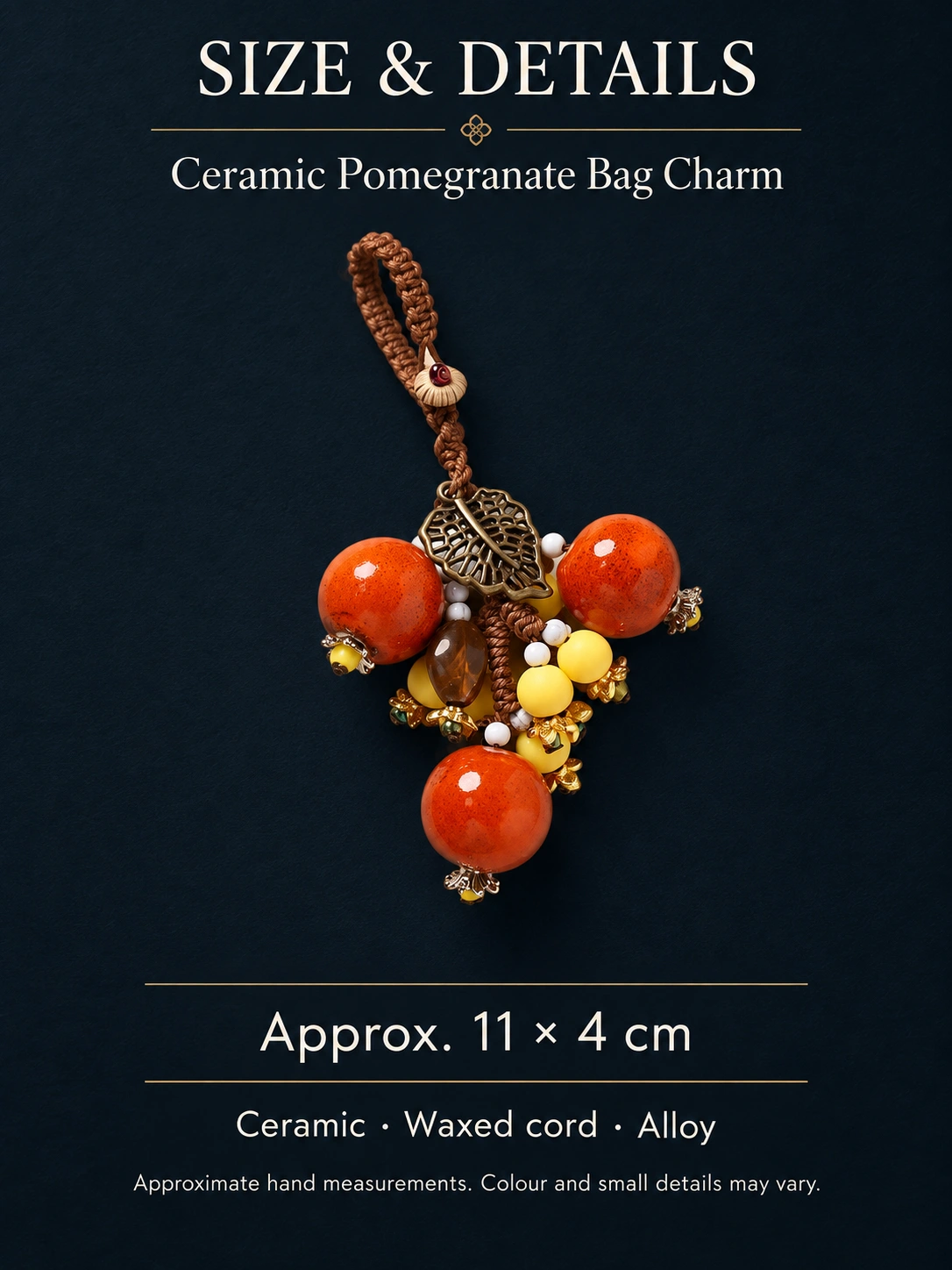 Ceramic pomegranate bag charm approximately 11 by 4 cm; ceramic, waxed cord and alloy